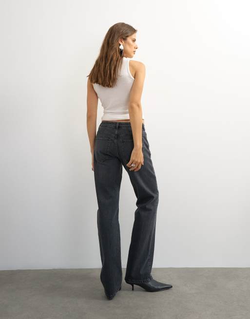 Topshop X Cara mid rise slim straight jean in washed black, 5 of 5
