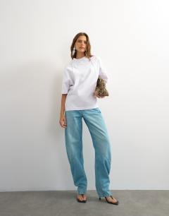 Model wearing Topshop X Cara open back tee in ecru
