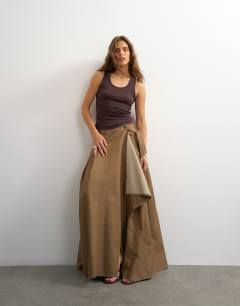 Model wearing X Cara scoop neck semi sheer tank top in brown