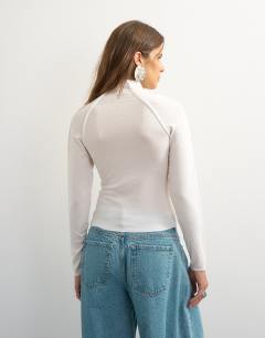 Model wearing X Cara seamed long sleeve T-shirt in ecru