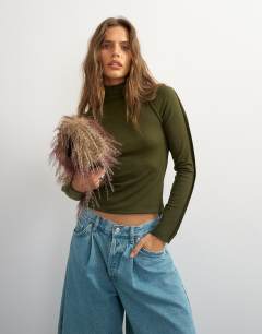 Model wearing X Cara seamed long sleeve T-shirt in khaki
