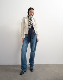 Model wearing Topshop x Talia Byre leather jacket in off white