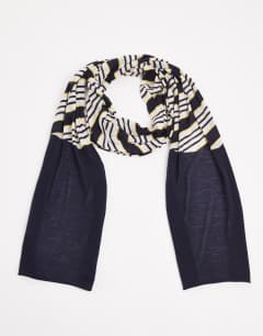 Model wearing Topshop x Talia Byre merino wool scarf in white stripe