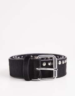 Model wearing Topshop x Talia Byre premium hair on real leather studded belt in black with navy backing