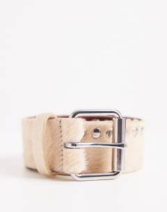 Model wearing Topshop x Talia Byre premium hair on real leather studded belt in ecru with burgundy backing