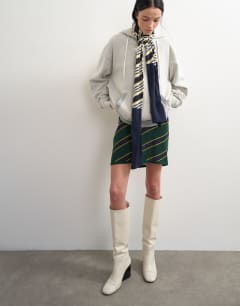 Model wearing Topshop x Talia Byre premium heavyweight hoodie in grey 