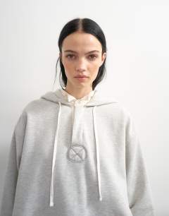 Model wearing Topshop x Talia Byre premium heavyweight hoodie in grey 