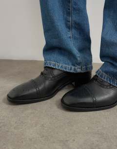 Model wearing Topshop x Talia Byre premium real leather brogue in black