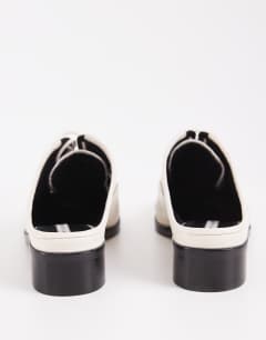 Model wearing Topshop x Talia Byre premium real leather brogue in off white