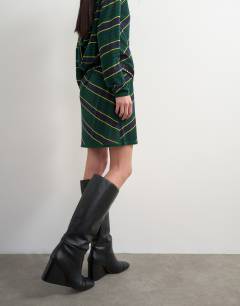 Model wearing Topshop x Talia Byre premium real leather knee high boot in black