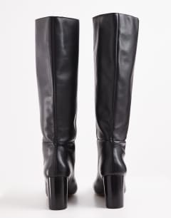 Model wearing Topshop x Talia Byre premium real leather knee high boot in black