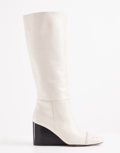 Model wearing Topshop x Talia Byre premium real leather knee high boot in off white