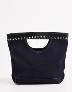Model wearing Topshop x Talia Byre premium real suede studded grab bag in navy