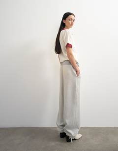 Model wearing Topshop x Talia Byre pull cord hem joggers in grey