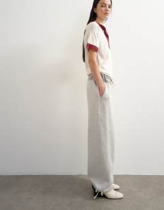 Model wearing Topshop x Talia Byre pull cord hem joggers in grey
