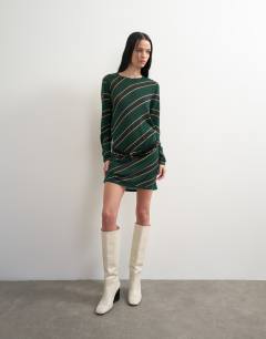 Model wearing Topshop x Talia Byre semi sheer merino wool cowl back dress in green stripe