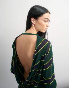 Model wearing Topshop x Talia Byre semi sheer merino wool cowl back dress in green stripe
