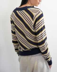 Model wearing Topshop x Talia Byre semi sheer merino wool v neck jumper in ecru stripe
