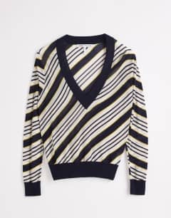 Model wearing Topshop x Talia Byre semi sheer merino wool v neck jumper in ecru stripe
