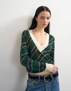 Model wearing Topshop x Talia Byre semi sheer merino wool v neck jumper in green stripe