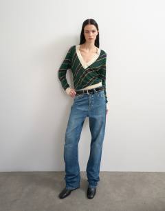 Model wearing Topshop x Talia Byre semi sheer merino wool v neck jumper in green stripe