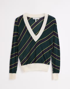 Model wearing Topshop x Talia Byre semi sheer merino wool v neck jumper in green stripe