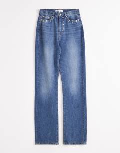 Model wearing Topshop x Talia Byre straight leg studded jeans in washed blue
