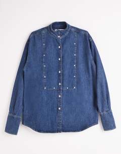 Model wearing Topshop x Talia Byre wide placket studded shirt in washed blue