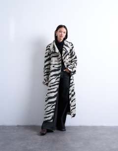 Zebra print trench coat in black