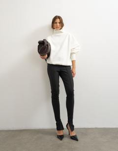 Model wearing Zip cuff trousers in black