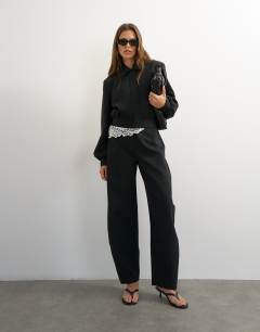 Model wearing Zip through formal blazer in black