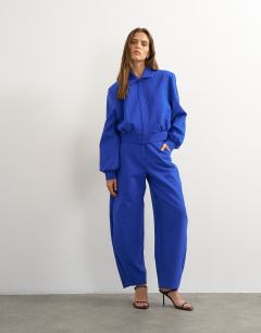 Model wearing Zip through formal blazer in blue