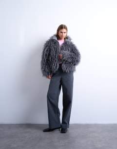 Model wearing Zip through mongolian faux fur funnel neck bomber in grey