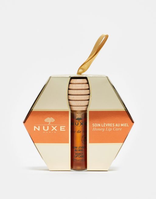 Tratamiento labial con miel en formato de adorno para el árbol de Navidad Rêve de Miel de NUXe