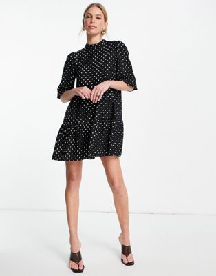 Trendyol high neck tiered mini dress in black and white polka dot