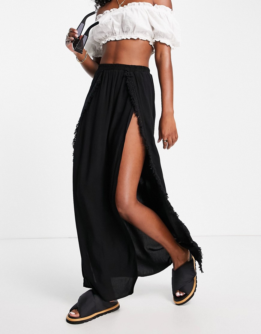 maxi skirt with fringe slit in black