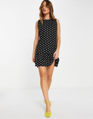 Trendyol sleeveless shift dress with peplum hem in polka dot