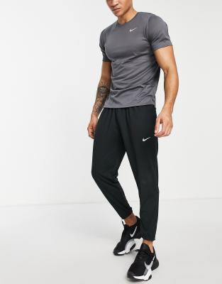 фото Трикотажные джоггеры черного цвета nike running challenger dri-fit-черный