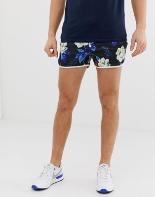 фото Трикотажные шорты для бега с цветочным принтом asos design-темно-синий