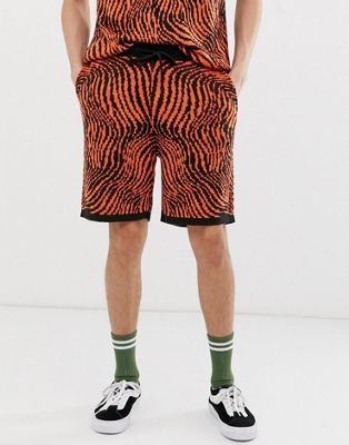 фото Трикотажные шорты рисунком \"зебра\" asos design-оранжевый