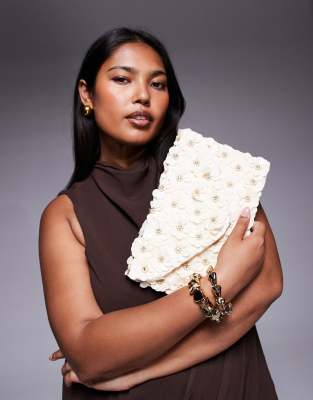 3D flower embellished envelope clutch bag with crossbody strap in off white
