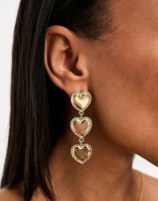 True Decadence statement heart drop earrings in gold - ASOS Price Checker