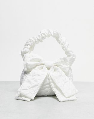True Decadence bow detail grab bag in white satin | ASOS