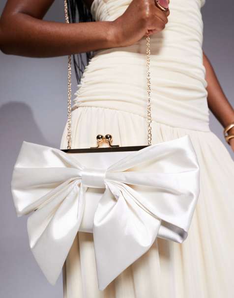 True Decadence bow front clutch bag in ivory - view 1