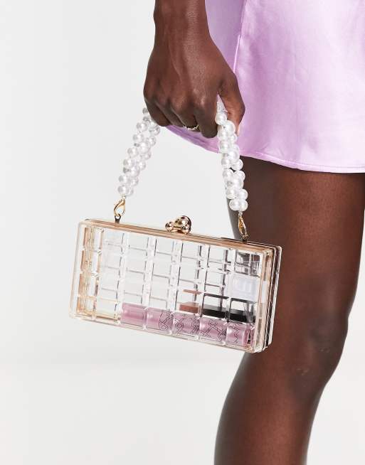 True Decadence clear clutch bag in clear with pearl handle