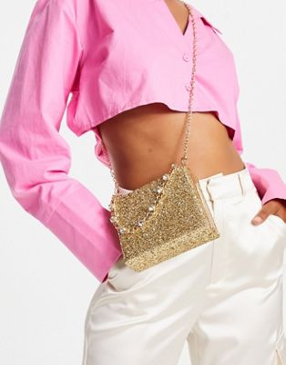 True Decadence clutch bag in glitter with chunky chain grab handle