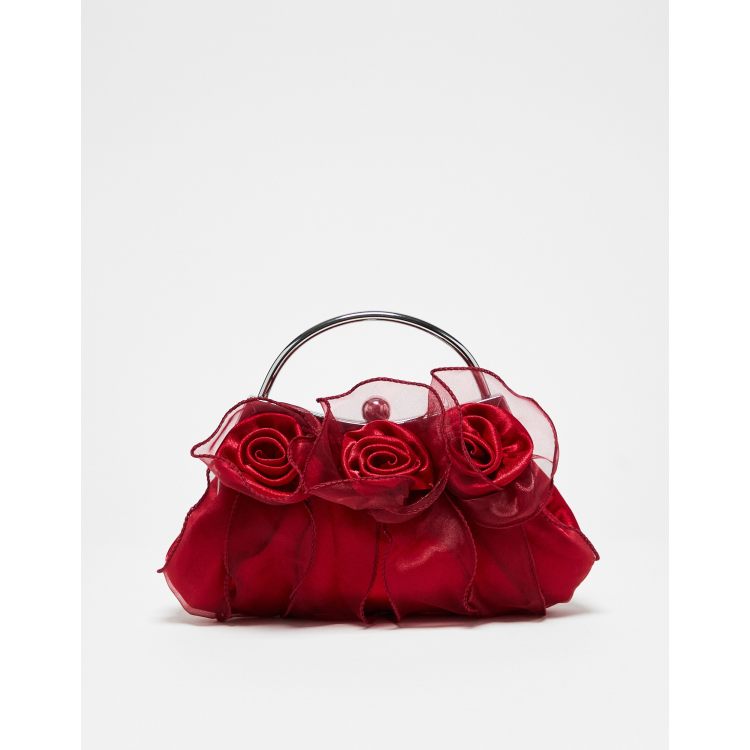 True Decadence clutch bag in mesh with floral corsages in red ASOS