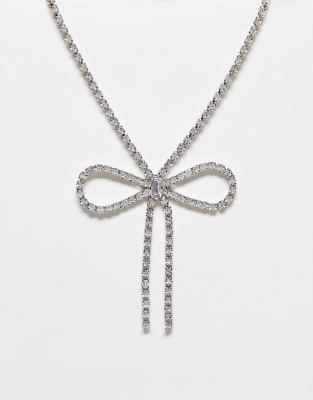 True Decadence crystal bow necklace in silver tone