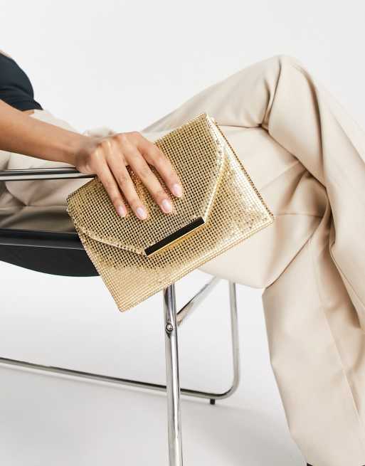 True Decadence envelope clutch bag in muted gold