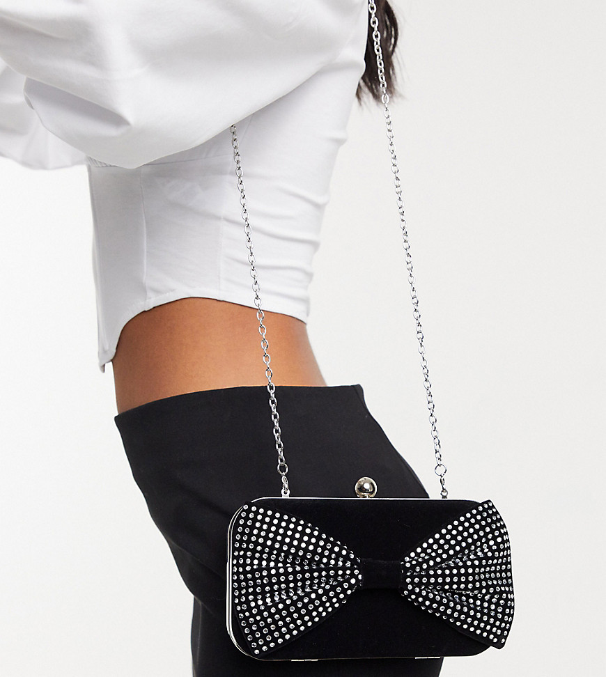 True Decadence Exclusive clutch bag in black with crystal bow detail